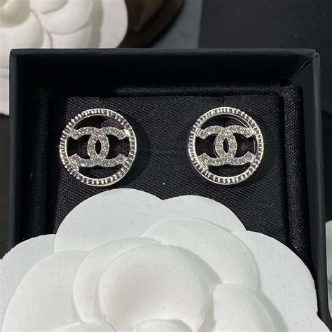 princess flower and pearl design earring from chanel|Chanel double c earrings.